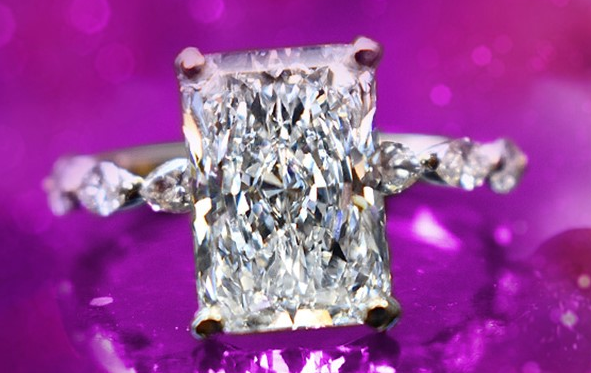Luckey's Jewelers Radiant Center diamond with marquise diamond band